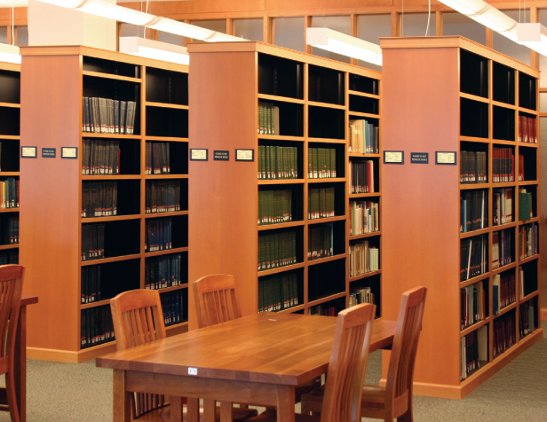 Wood-clad library shelving stacks with reading table — Aurora MJ Cantilever Wood-Tek